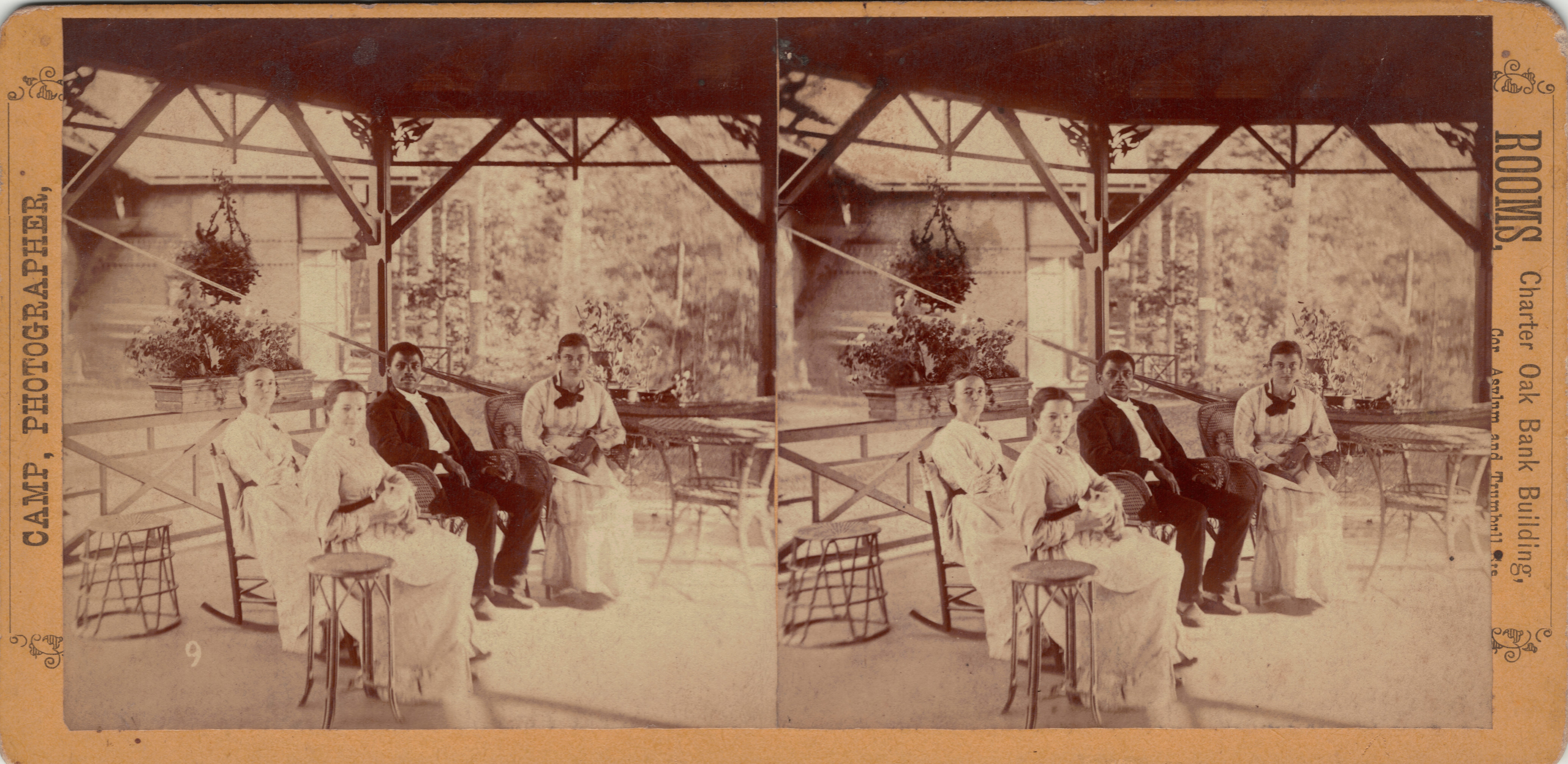 click to see item George Griffin and four women on the ombra of the Clemens' Hartford home