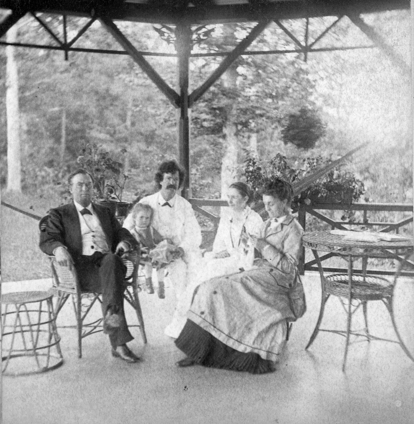 Dr. A Reeves Jackson, Susy Clemens, Samuel Clemens, Olivia Clemens and Mrs. Jackson on the ombra of the Clemens' Hartford home